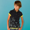 Polo manga corta palmeras niño