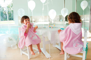 Poncho rosa conejito